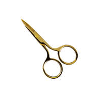 Tesouras douradas Addi